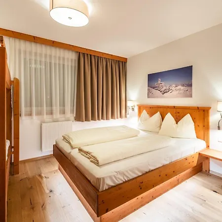 Alpenchalet Апартаменты 4*